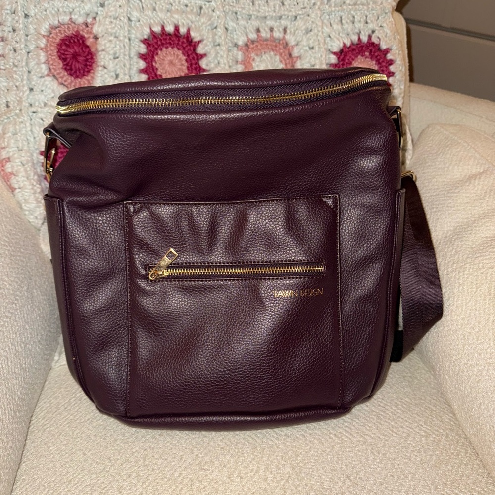 Large Leather Fawn Design deep plum purple color. Never used.